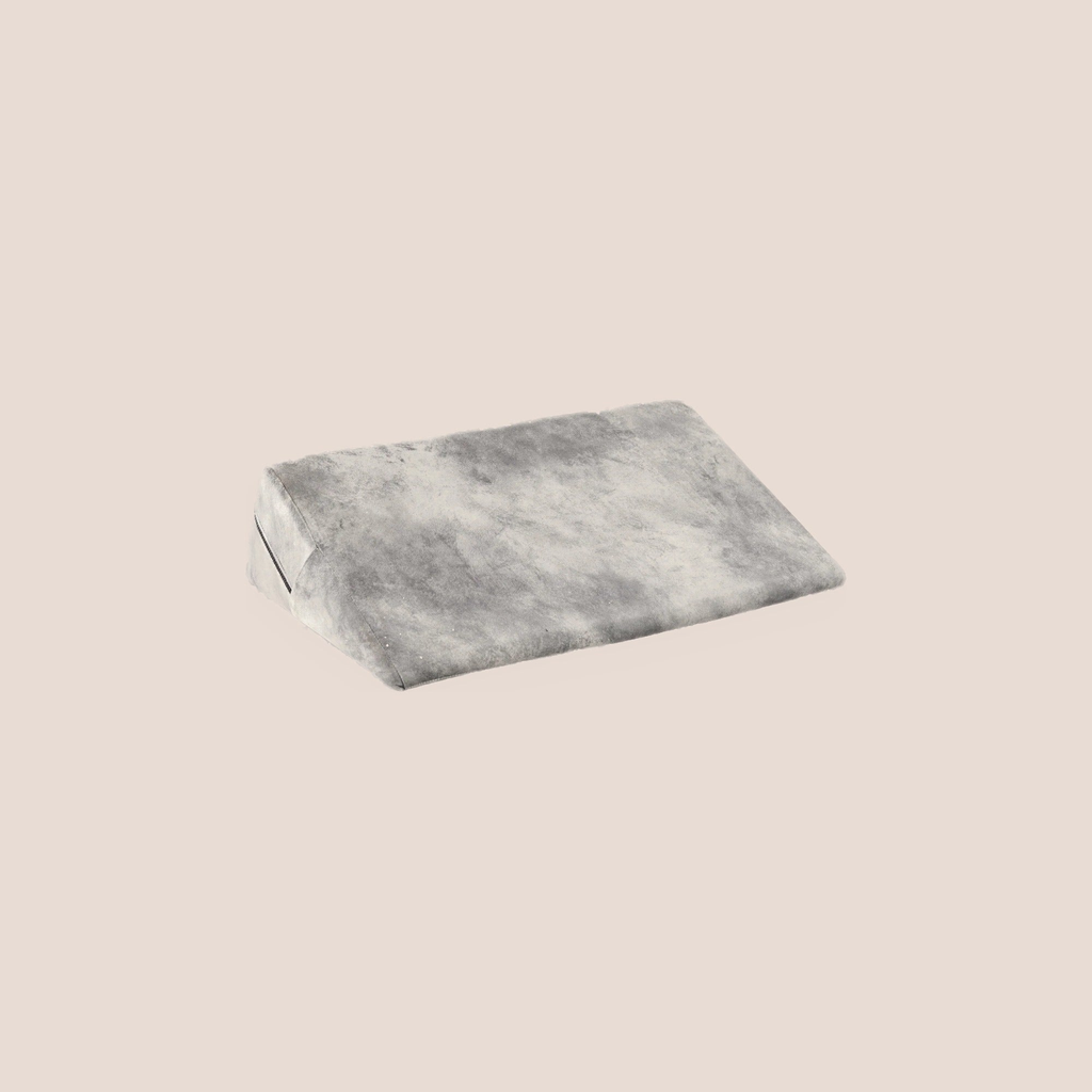 Alight — intimacy support furniture on a warm blush background