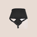 Alluring — harness piece on a warm blush background