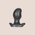 Bedded — weighted intimate plug on a warm blush background