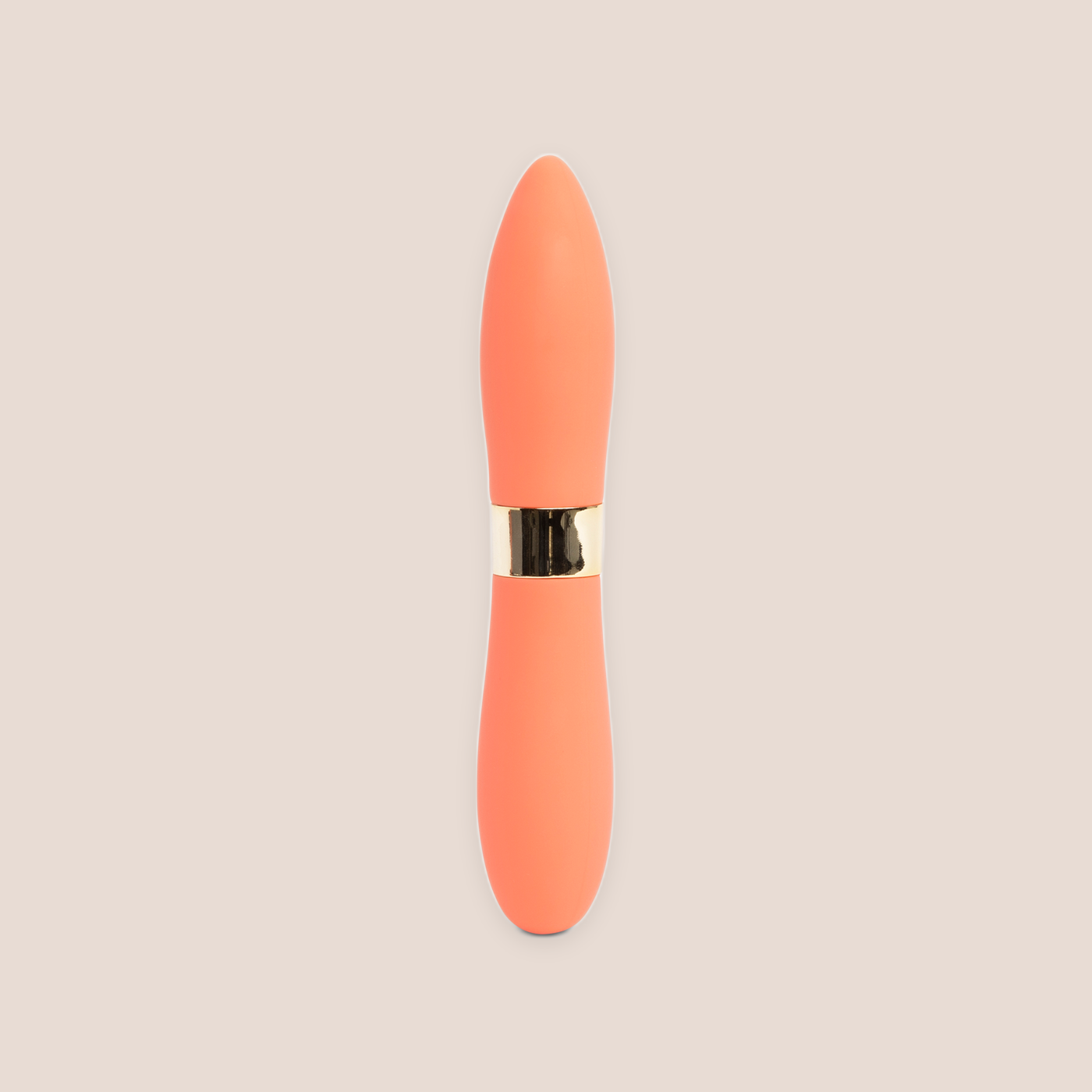 Beguiled — intimate massager on a warm blush background