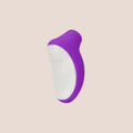Beholden — intimate massager on a warm blush background