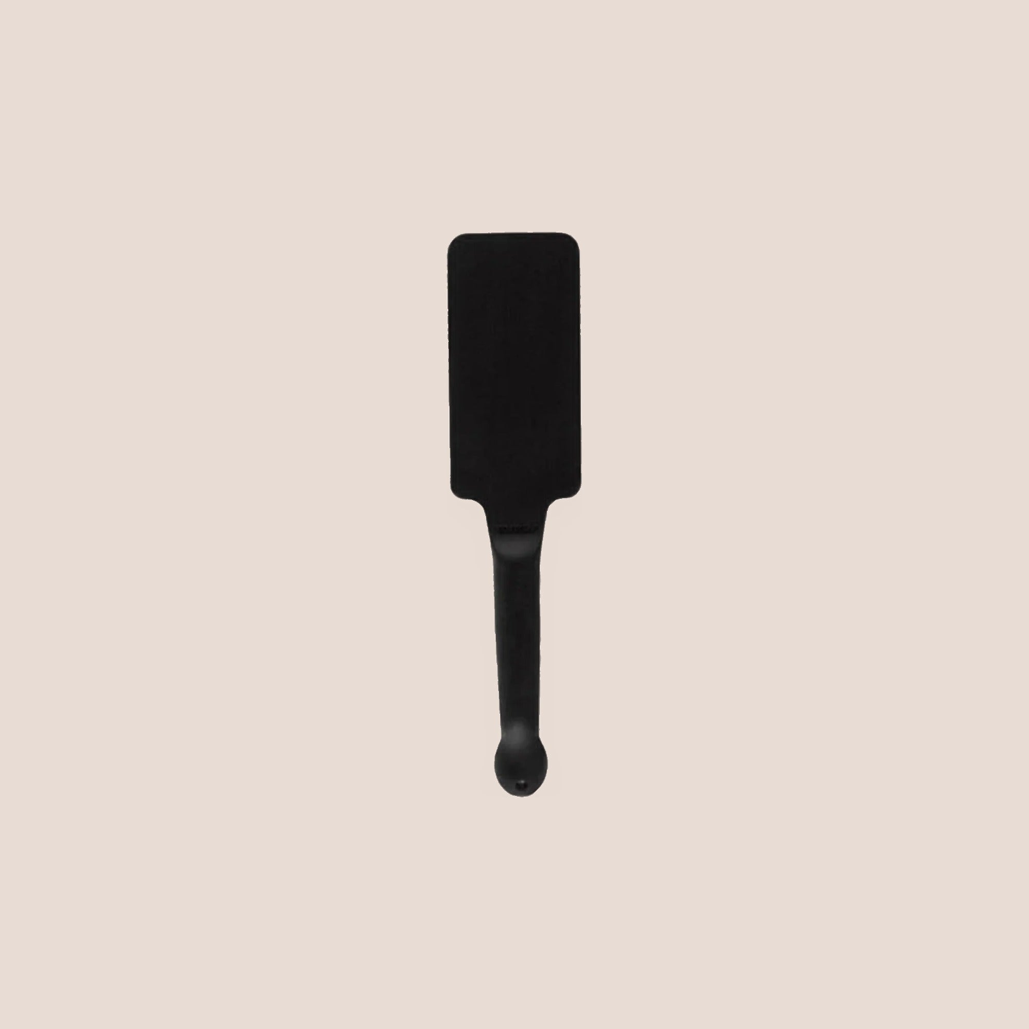 Bewitched — restraint piece on a warm blush background