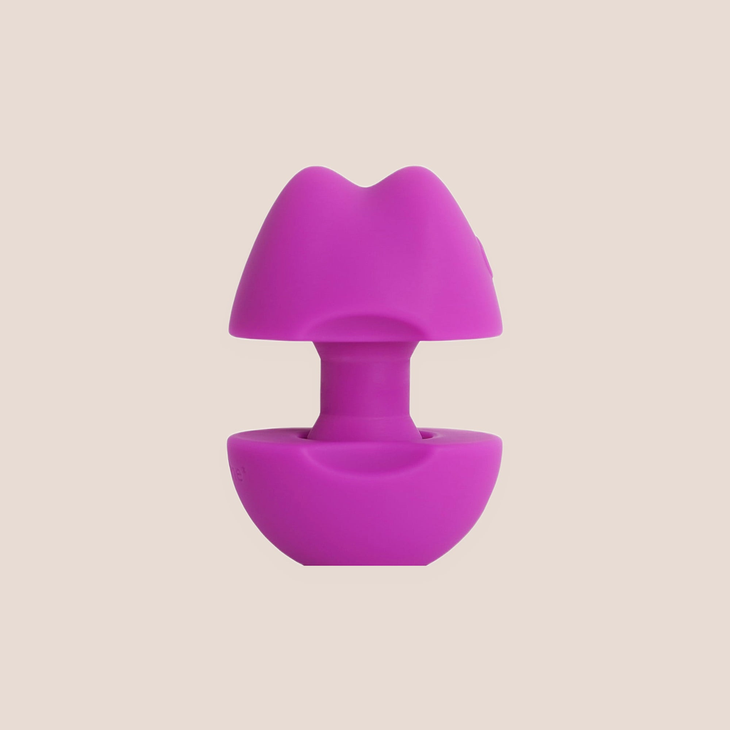 Wakening — intimate massager on a warm blush background