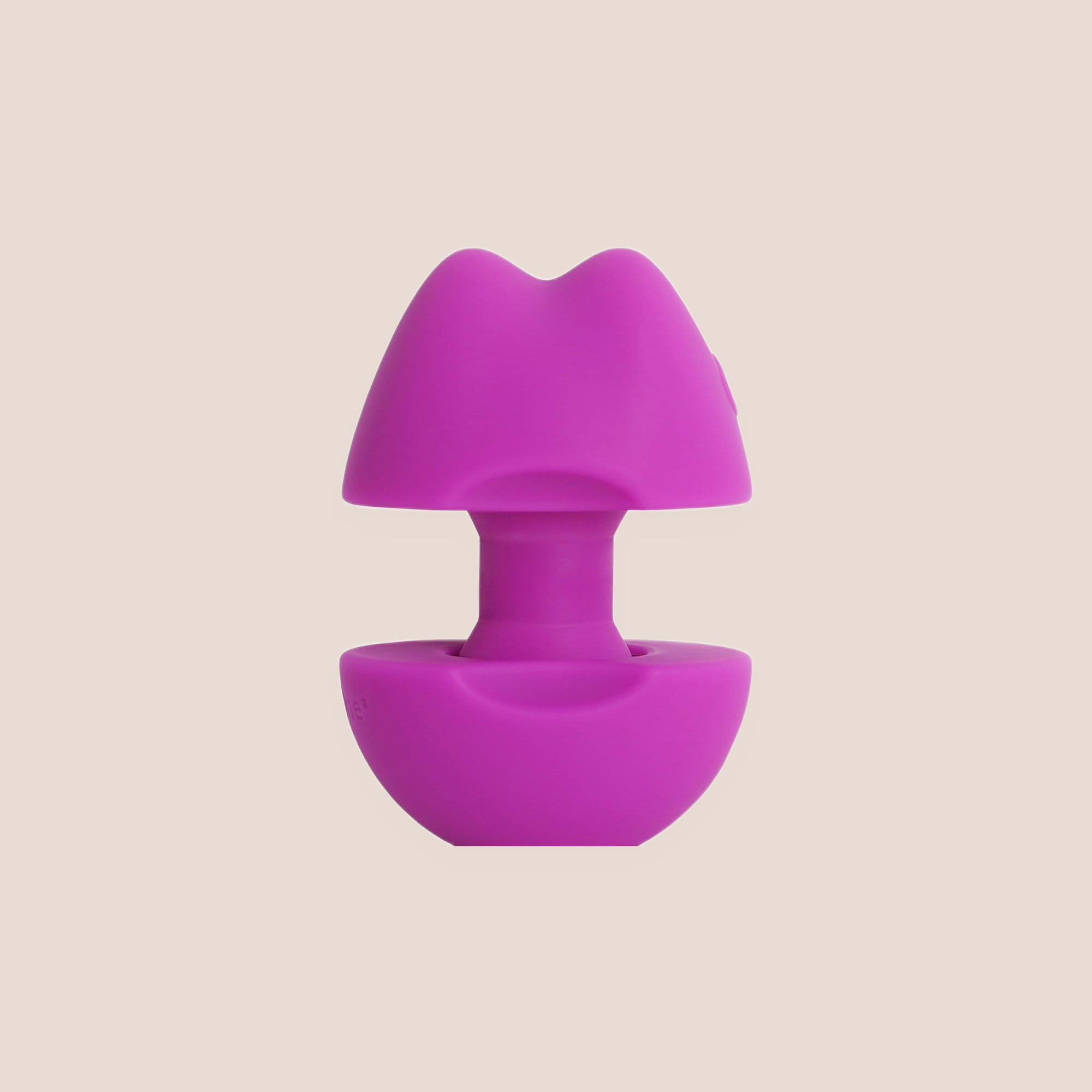 Wakening — intimate massager on a warm blush background