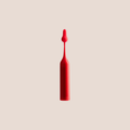 Heedful — intimate massager on a warm blush background