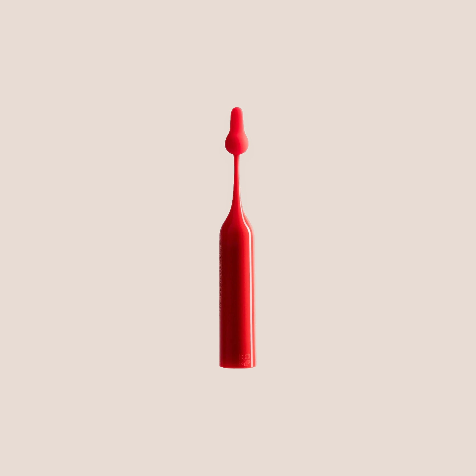 Heedful — intimate massager on a warm blush background