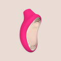 Charmed — intimate massager on a warm blush background