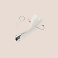 Circling — intimate massager on a warm blush background