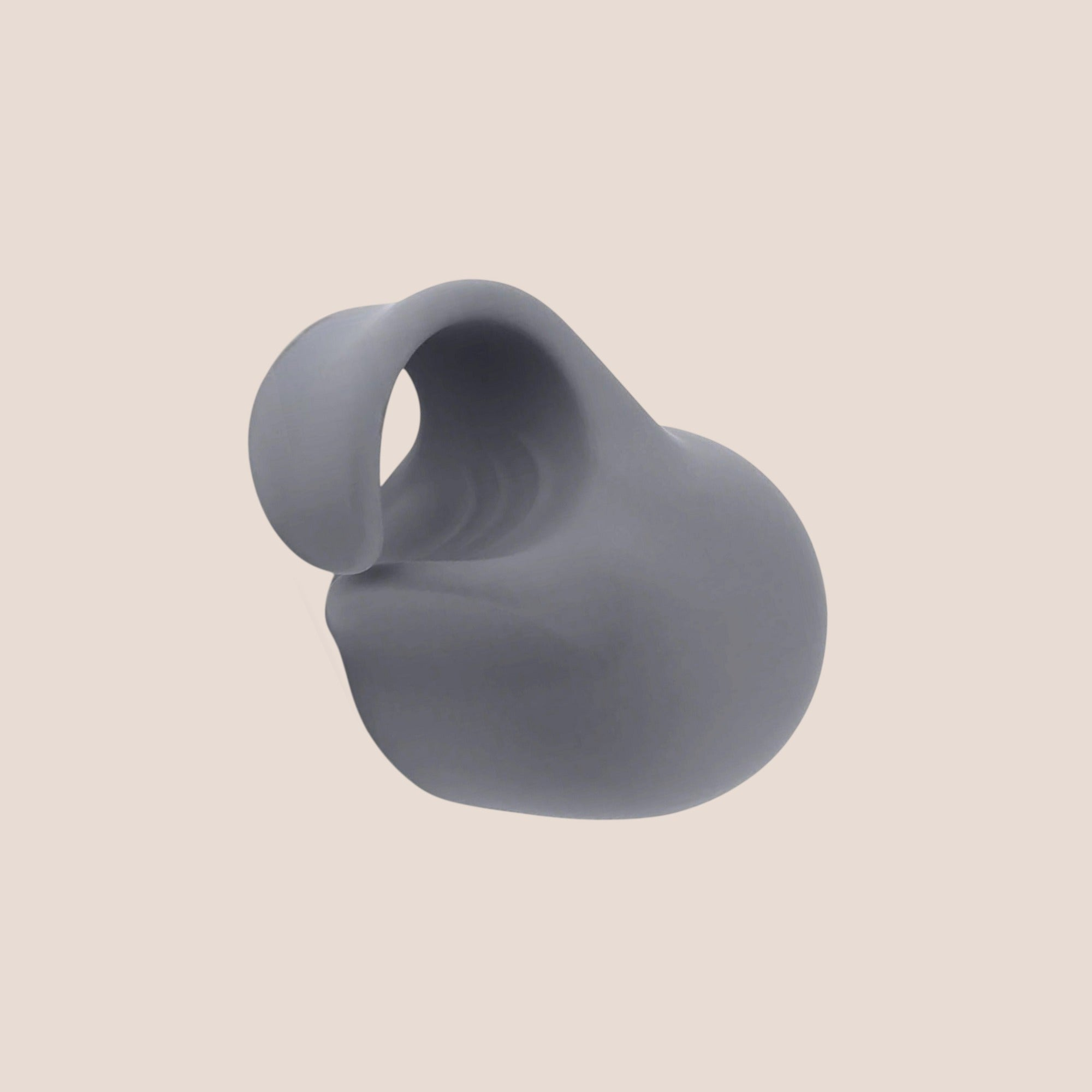 Climax — intimate massager on a warm blush background