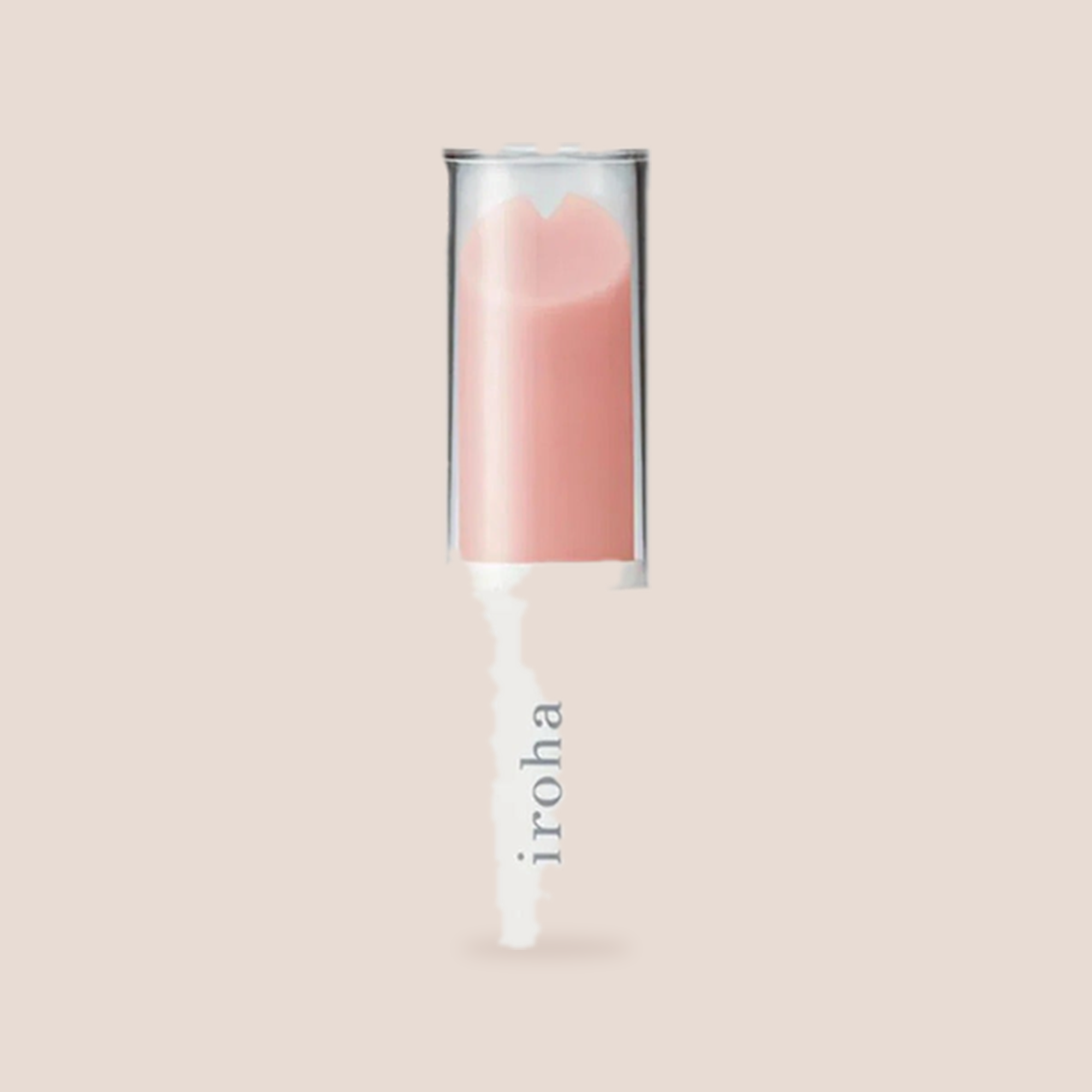 Cloistered — intimate massager on a warm blush background