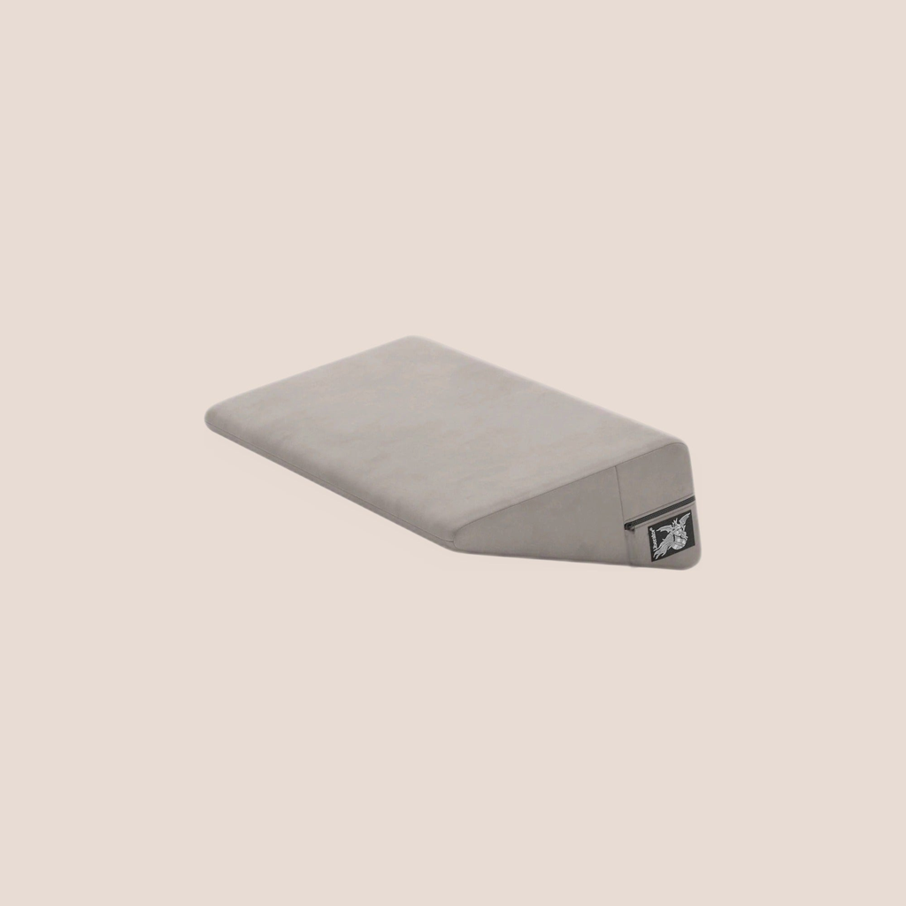 Composed — intimacy support furniture on a warm blush background