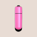 Daring — intimate massager on a warm blush background