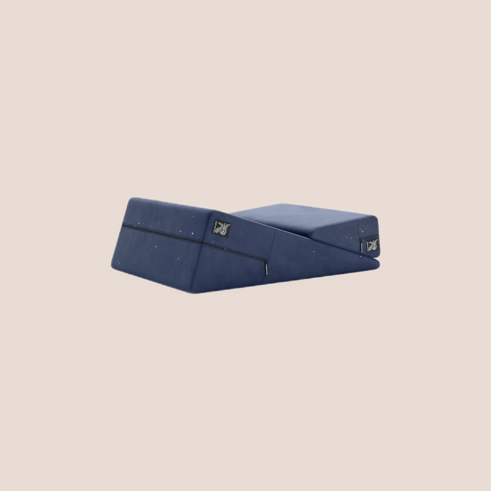 Dedicated — intimacy support furniture on a warm blush background