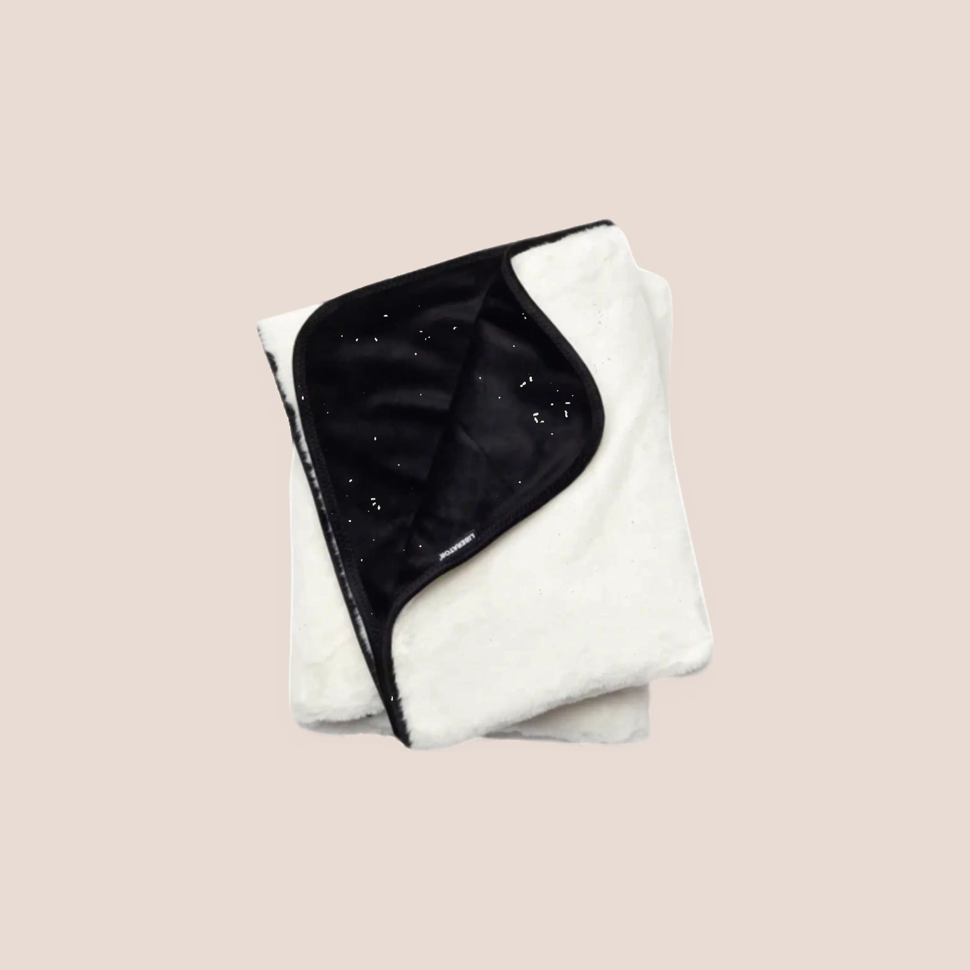Draped — intimacy support furniture on a warm blush background