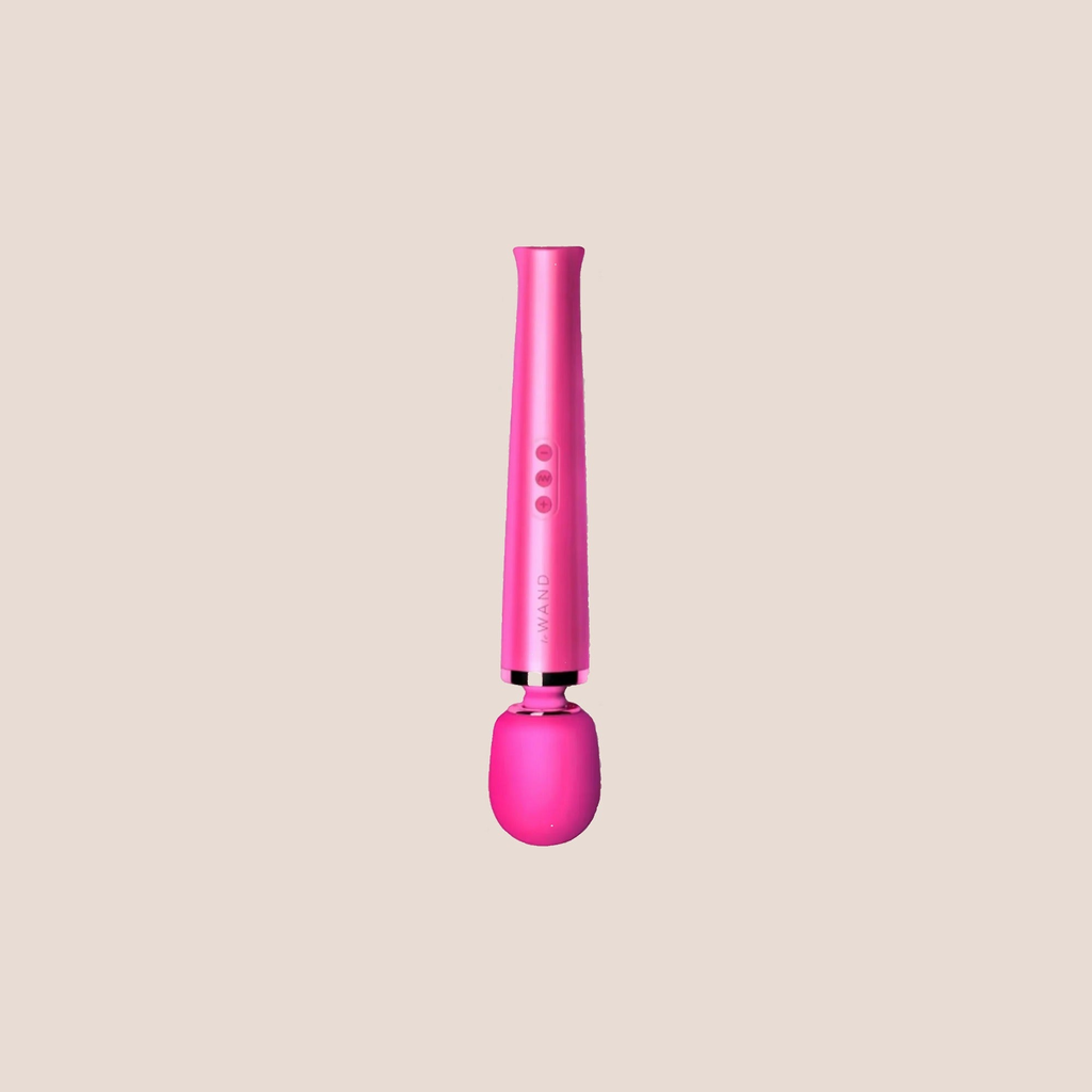 Engulfing — intimate massager on a warm blush background