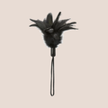 Enticed — restraint piece on a warm blush background