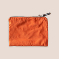 Glad — intimate accessory on a warm blush background
