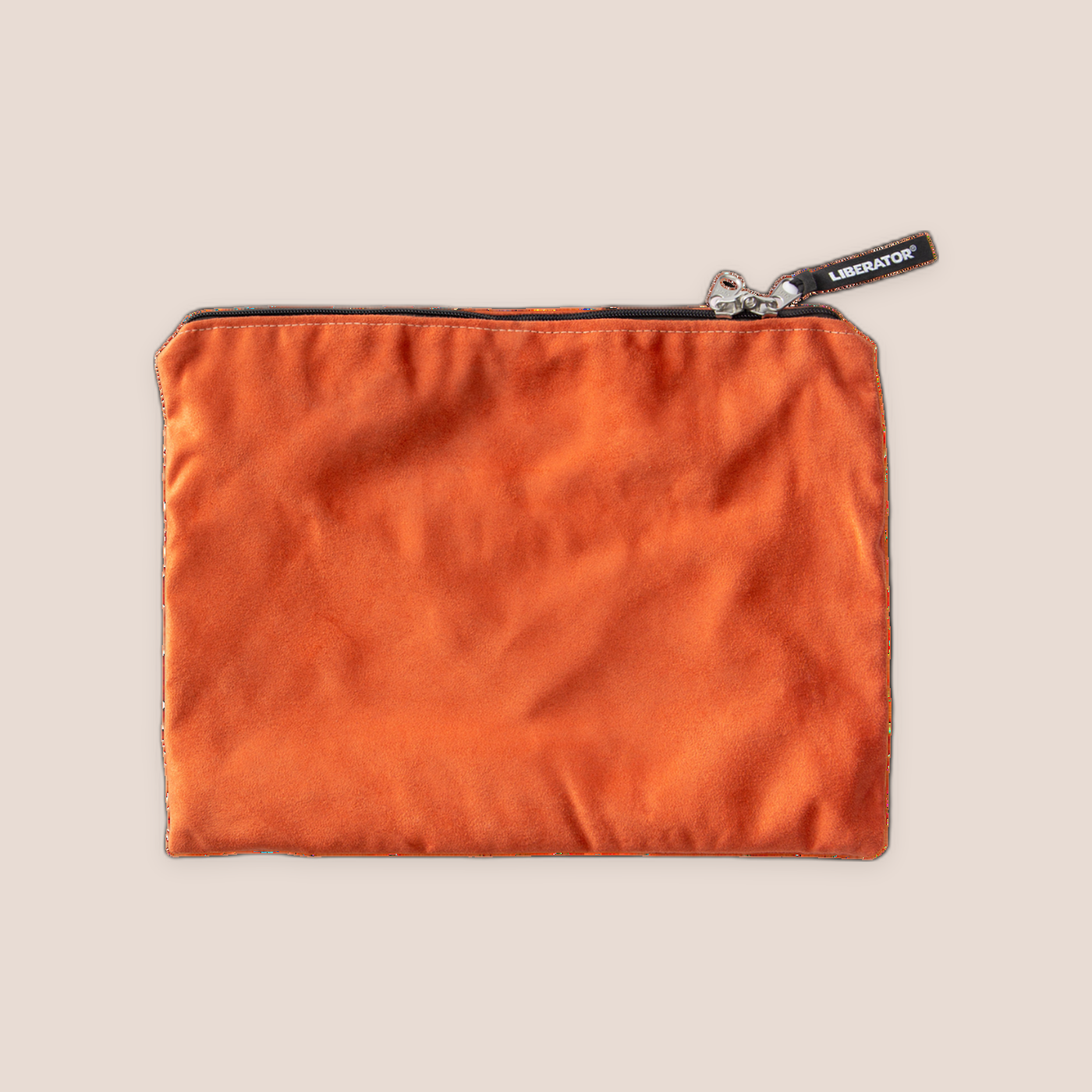 Glad — intimate accessory on a warm blush background