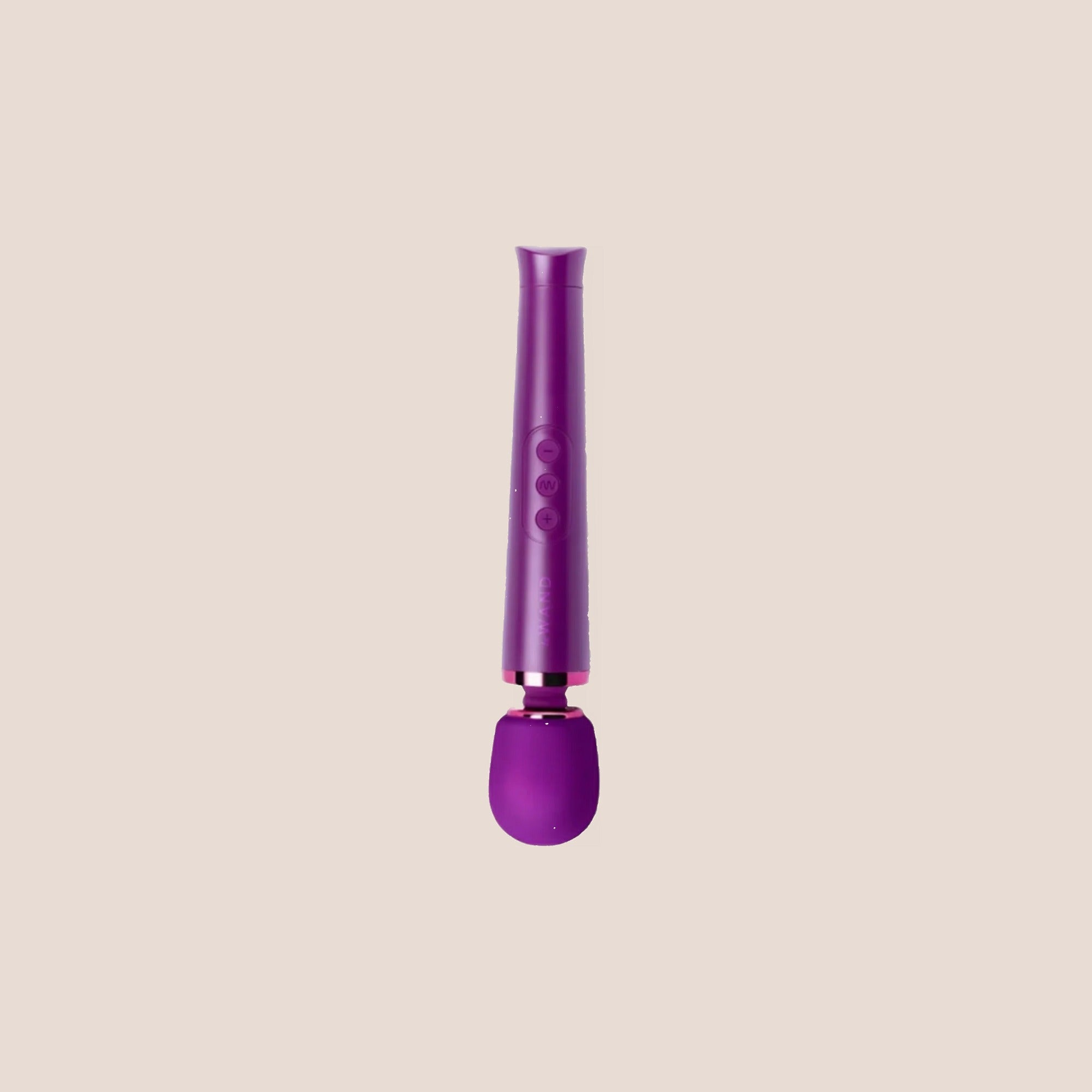Intimate — intimate massager on a warm blush background