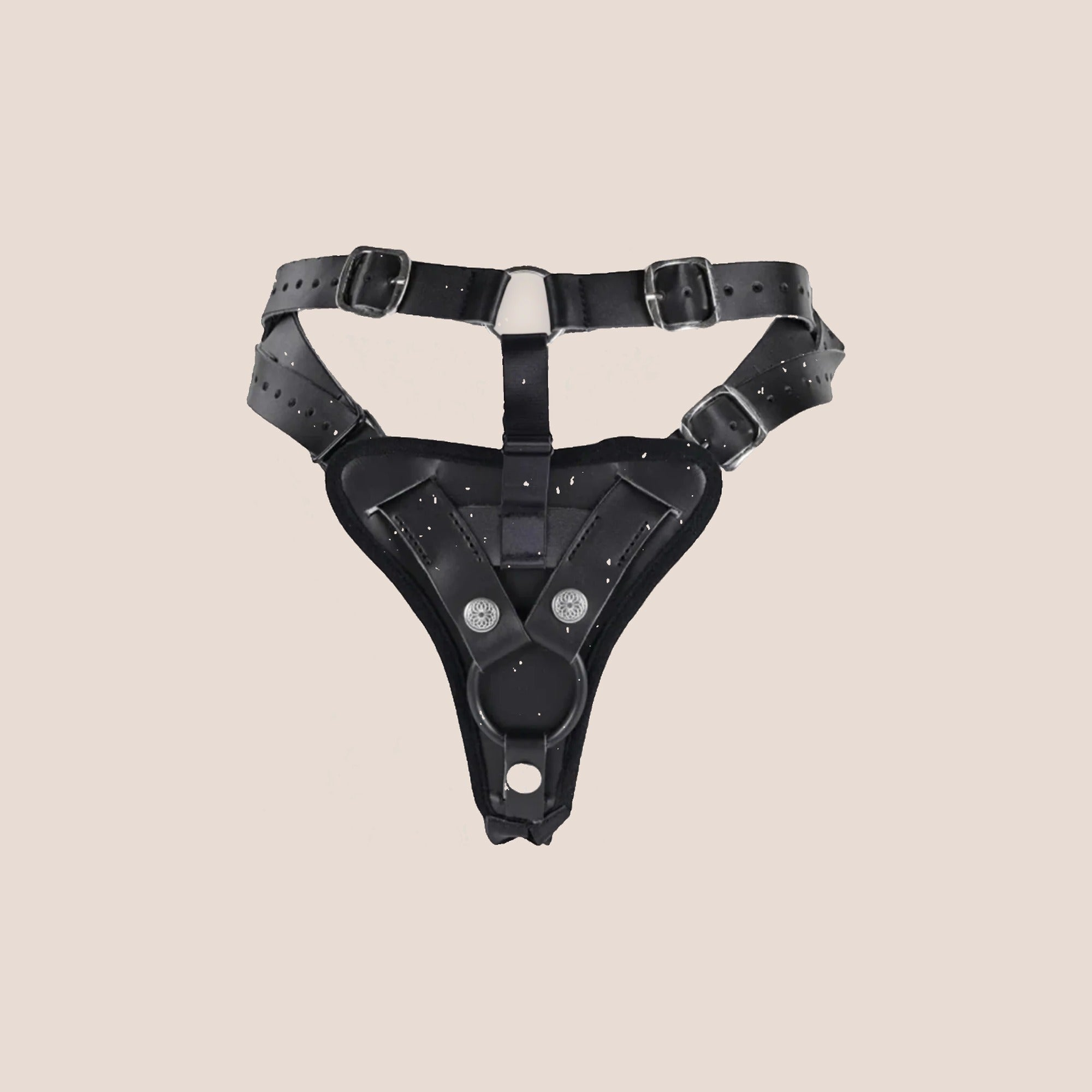 Knowing — harness piece on a warm blush background