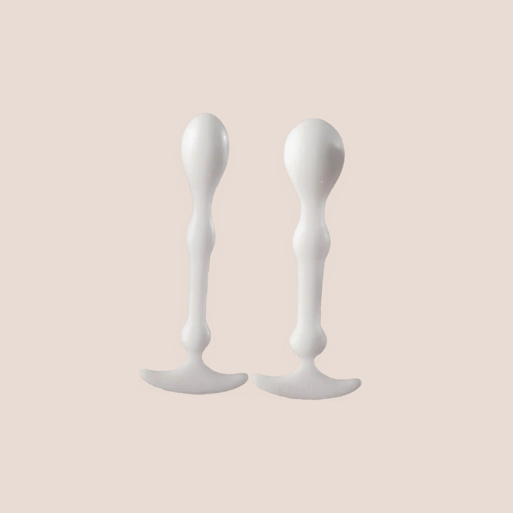 Halcyon — intimate wellness piece on a warm blush background