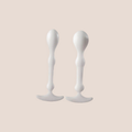 Halcyon — intimate wellness piece on a warm blush background