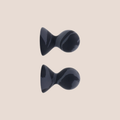 Piqued — restraint piece on a warm blush background