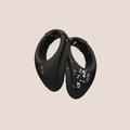 Present — intimate massager on a warm blush background