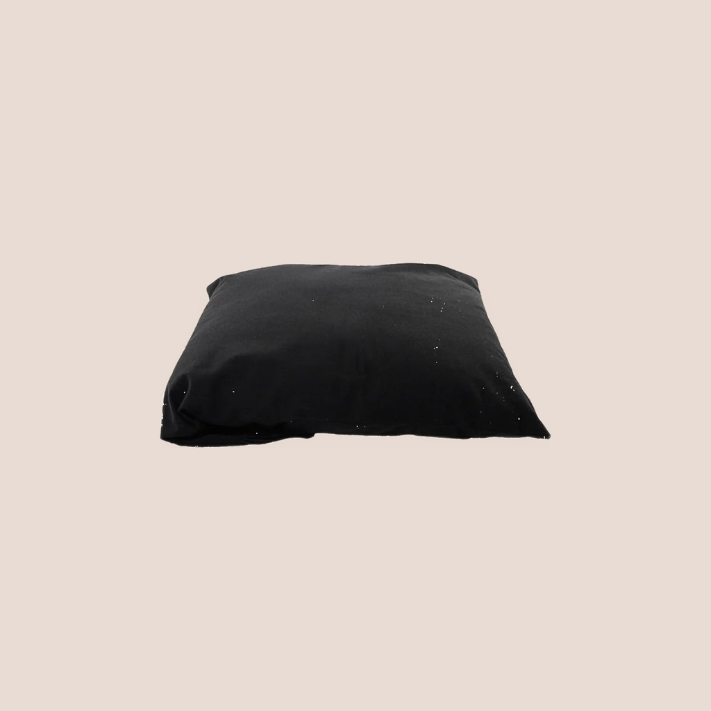 Protected — intimate accessory on a warm blush background