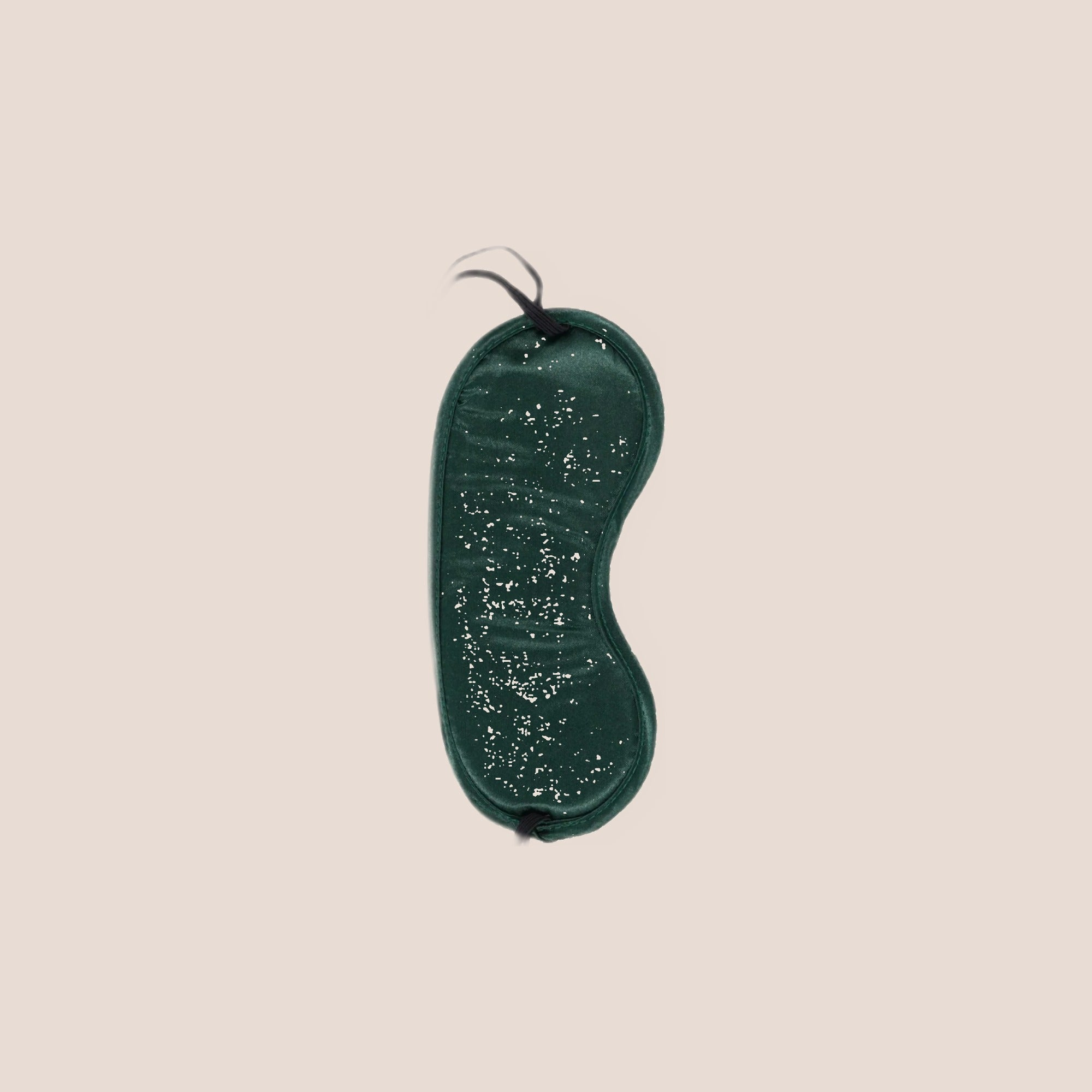 Quietude — intimate accessory on a warm blush background