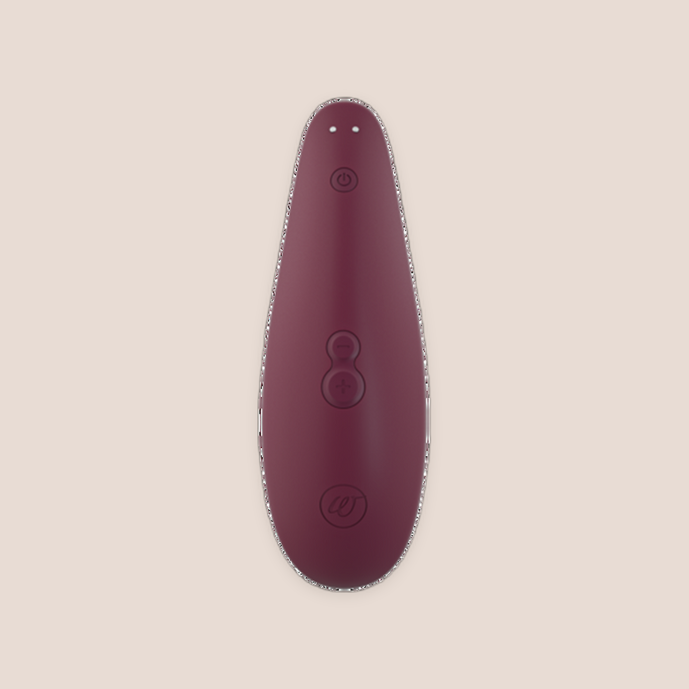 Reflective — intimate massager on a warm blush background