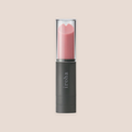 Relieved — intimate massager on a warm blush background