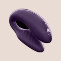 Rich — intimate massager on a warm blush background