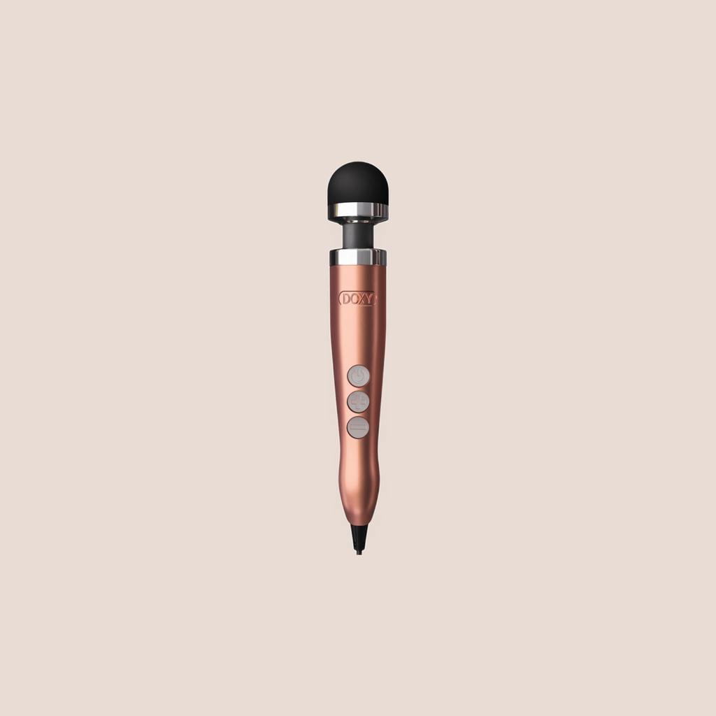 Rosy — intimate massager on a warm blush background