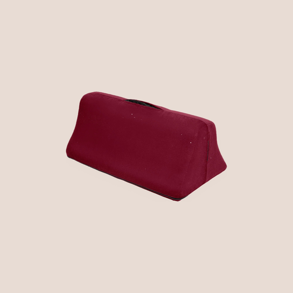 Rounded — restraint piece on a warm blush background