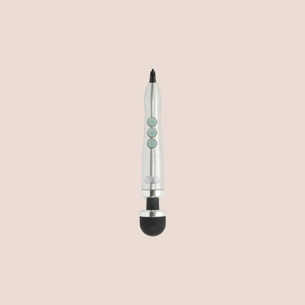 Rumble — intimate massager on a warm blush background