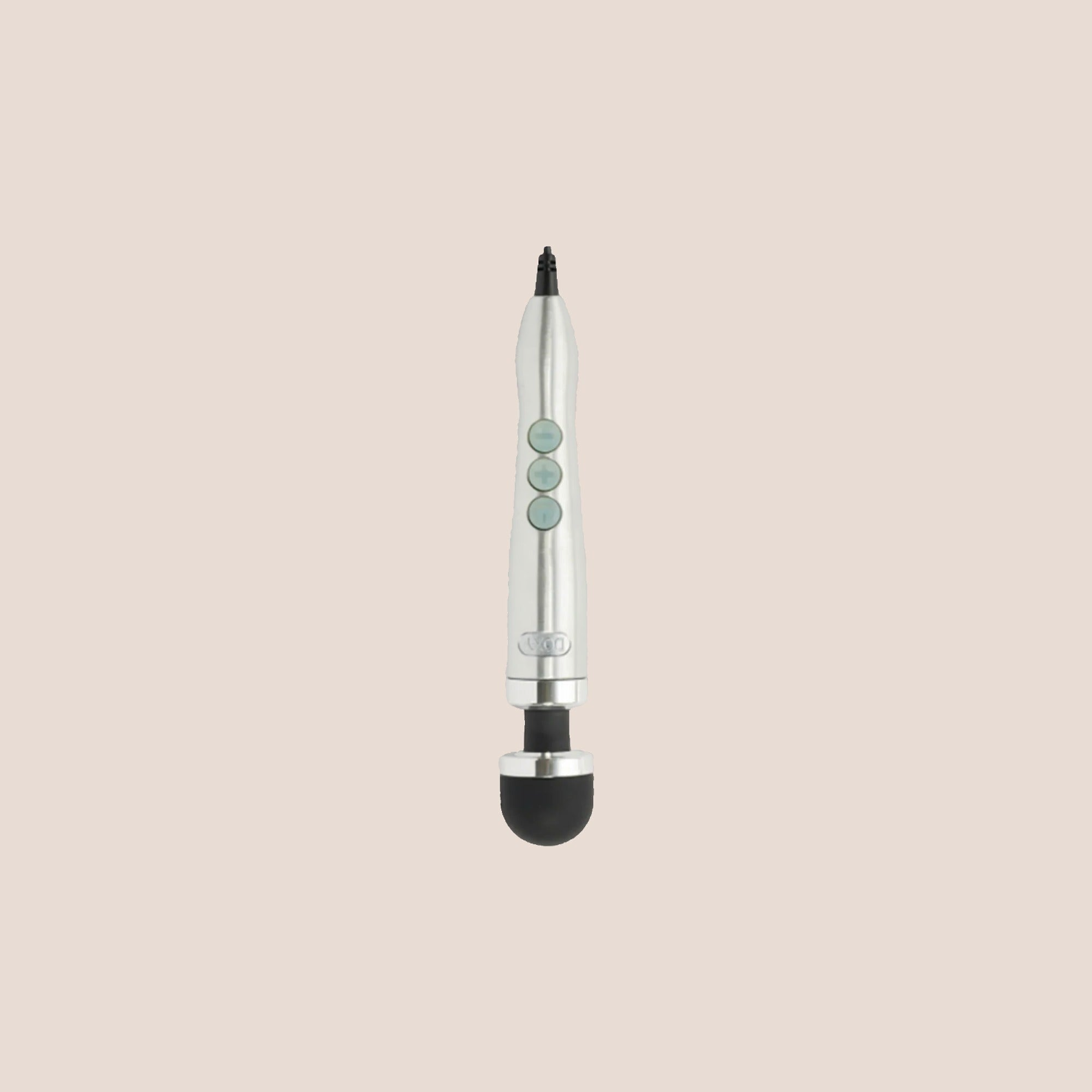 Rumble — intimate massager on a warm blush background