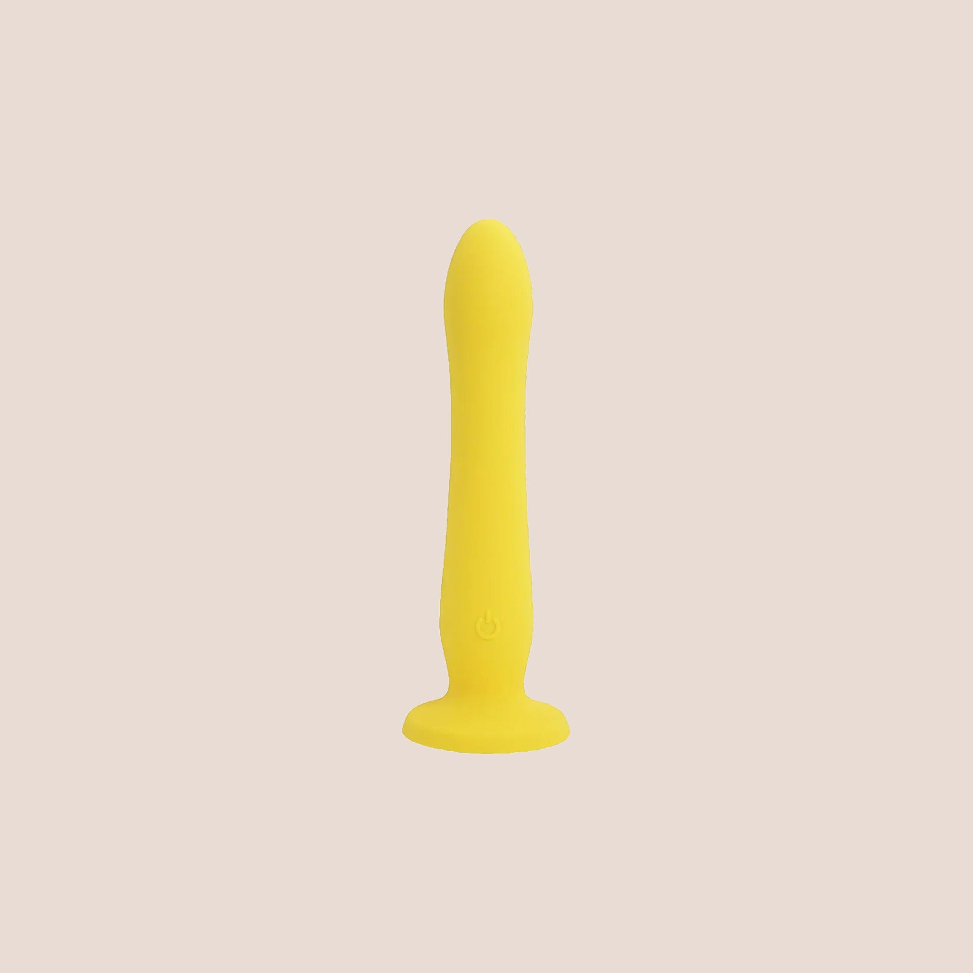 Showered — weighted intimate plug on a warm blush background