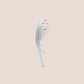 Surfaced — intimate massager on a warm blush background