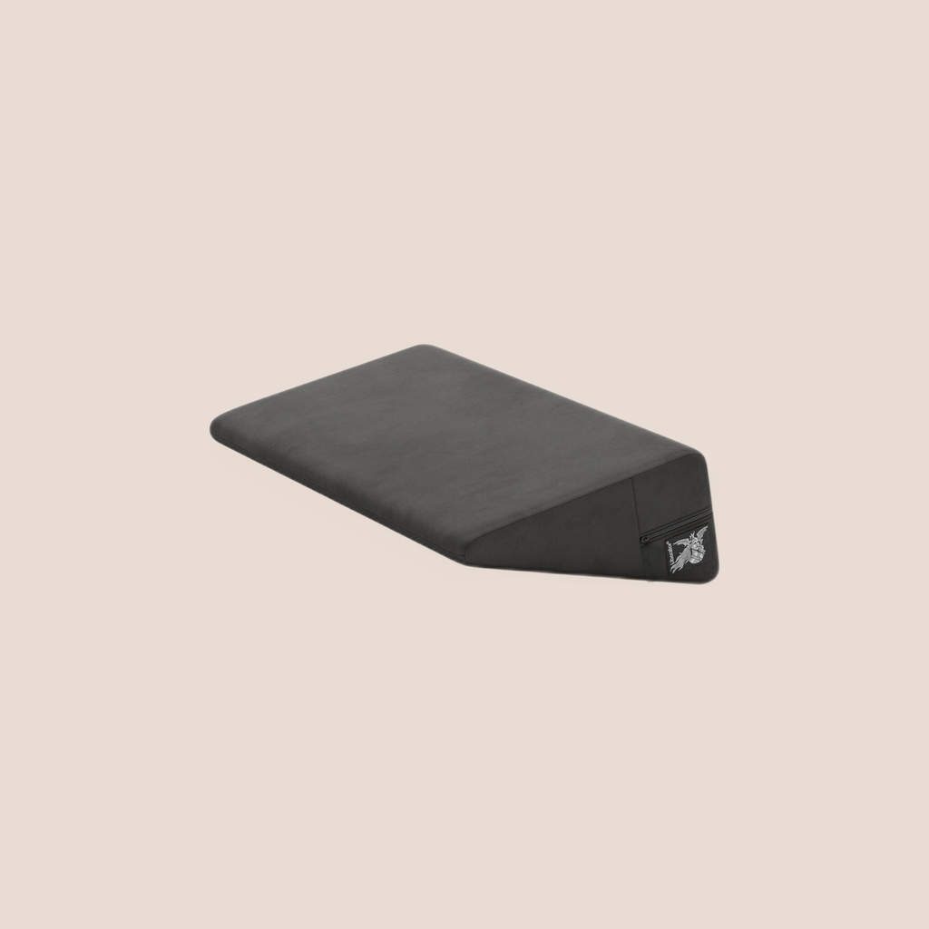 Swept — intimacy support furniture on a warm blush background