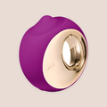 Swirling — intimate massager on a warm blush background