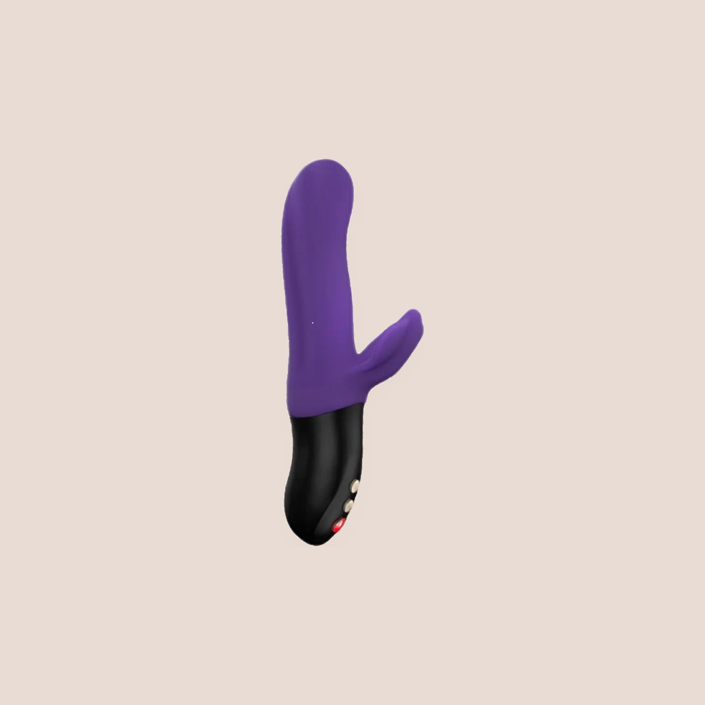 Unfurling — intimate massager on a warm blush background