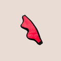 Veiled — restraint piece on a warm blush background